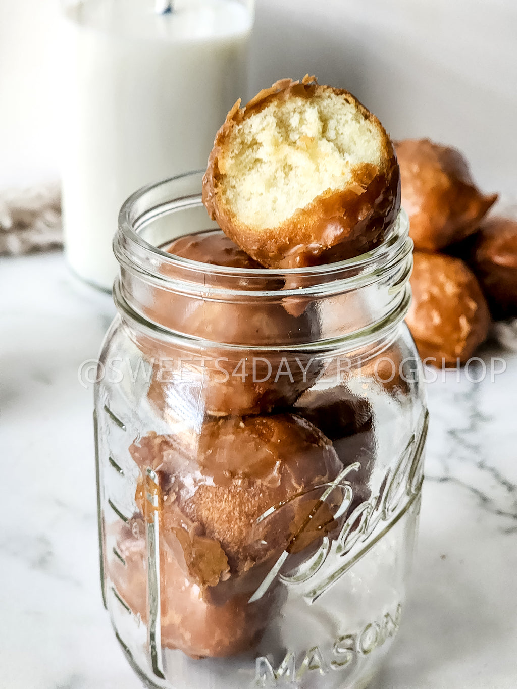 Coffee Glazed Donut Holes on Marble