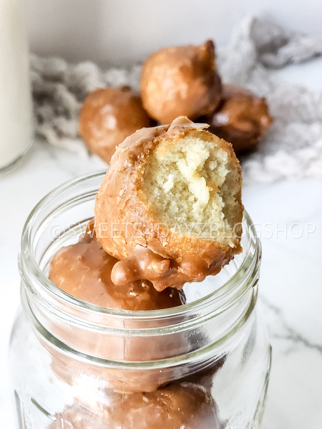 Coffee Glazed Donut Holes on Marble