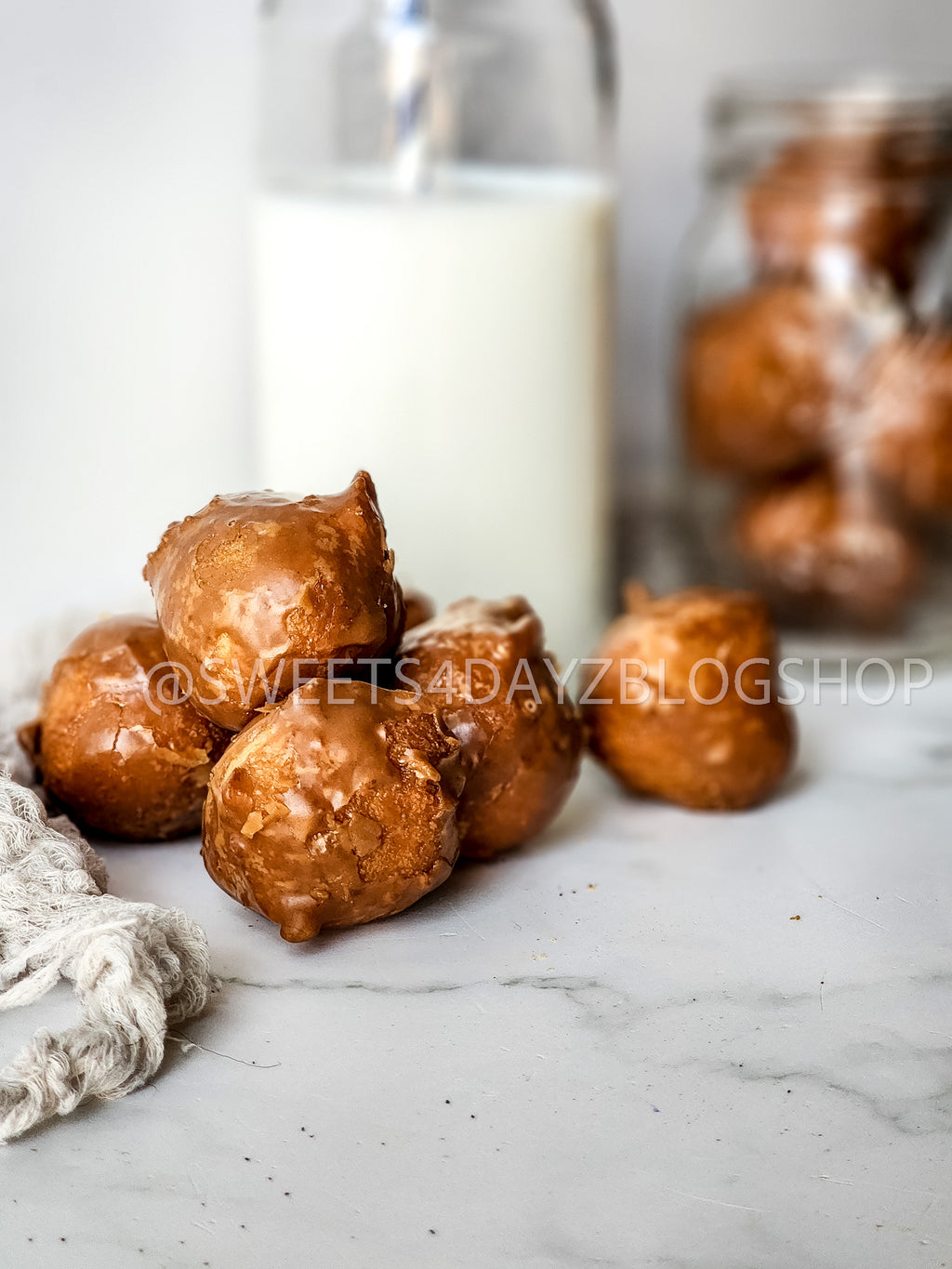 Coffee Glazed Donut Holes on Marble