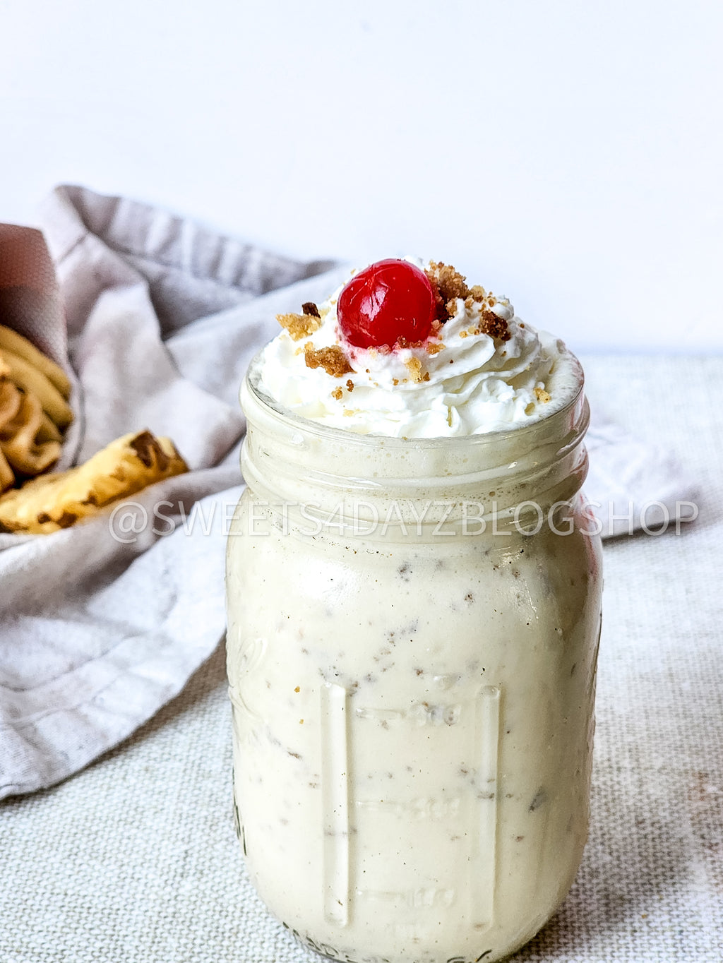 Copycat Chick Fil A Caramel Crunch Milkshake on Linen