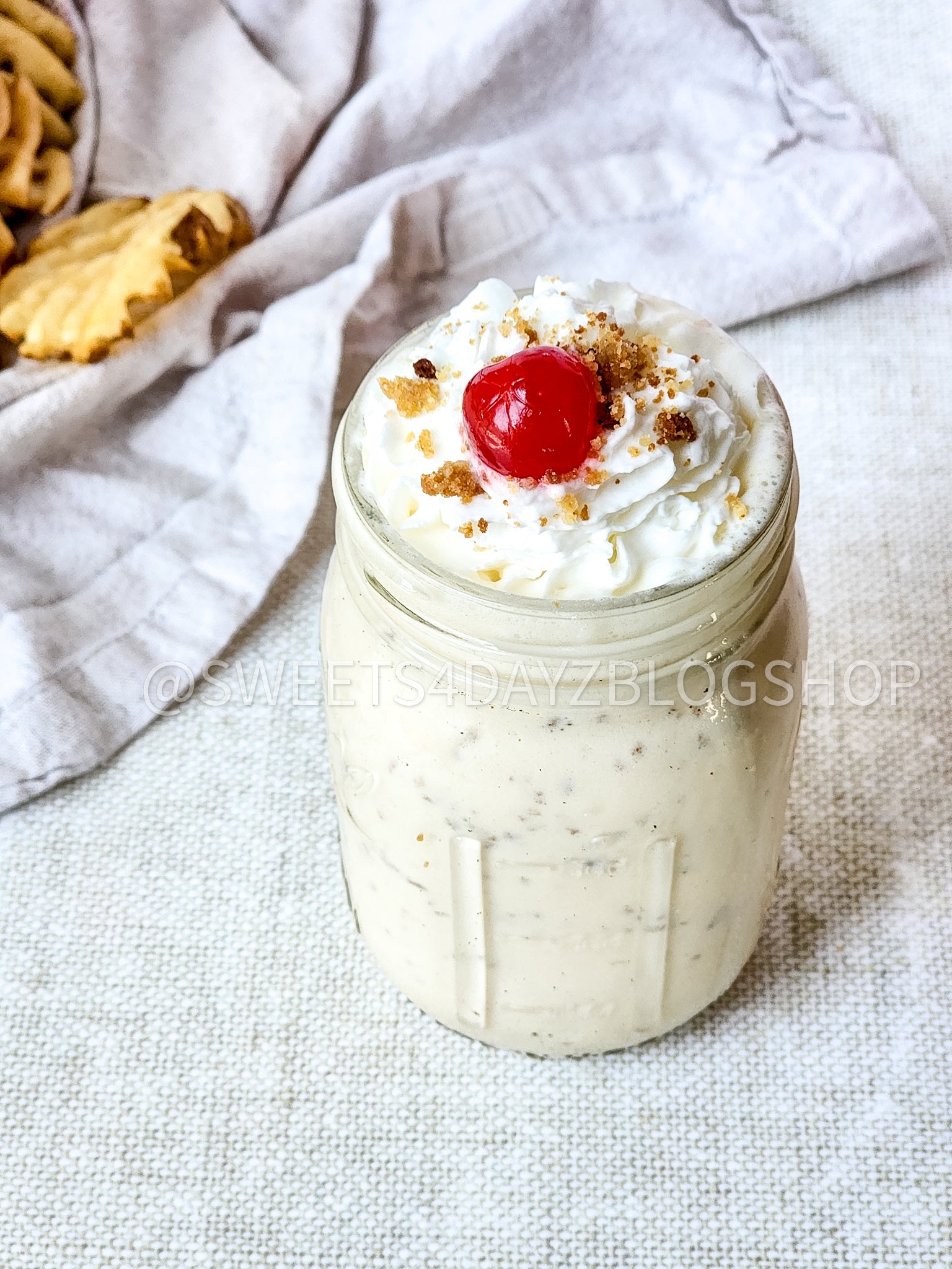 Copycat Chick Fil A Caramel Crunch Milkshake on Linen