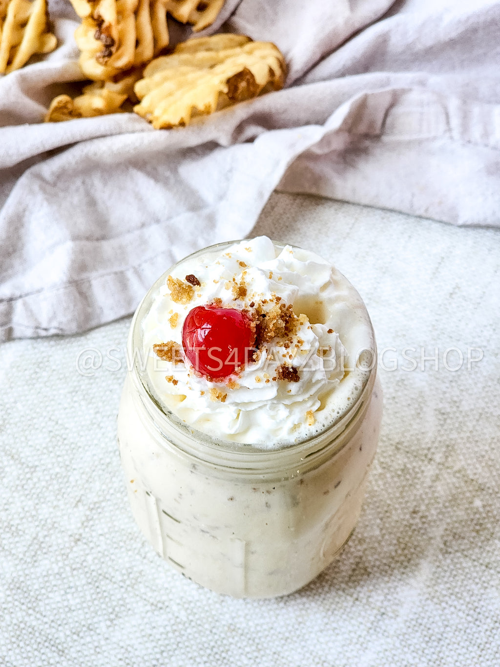 Copycat Chick Fil A Caramel Crunch Milkshake on Linen
