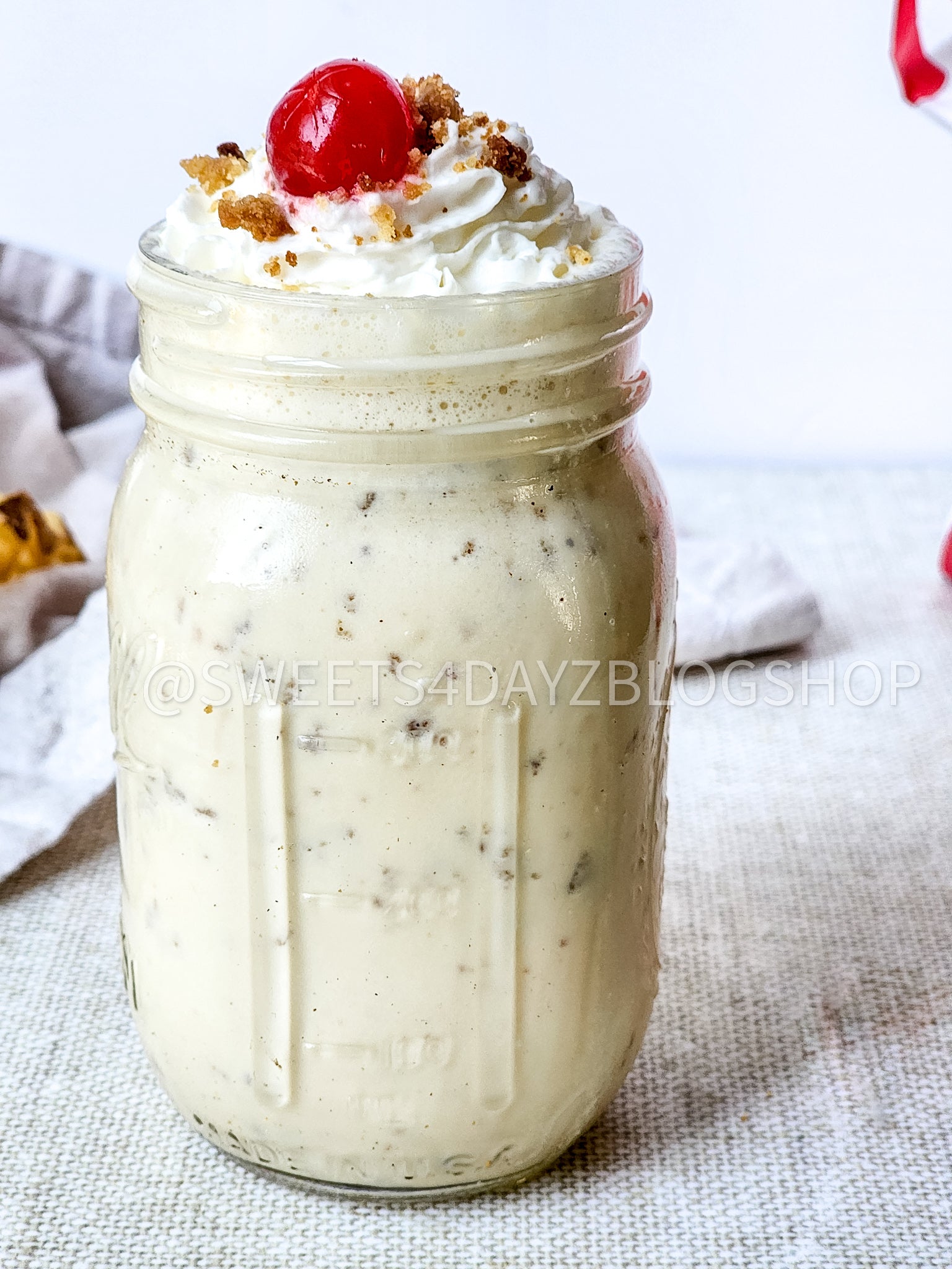 Copycat Chick Fil A Caramel Crunch Milkshake on Linen
