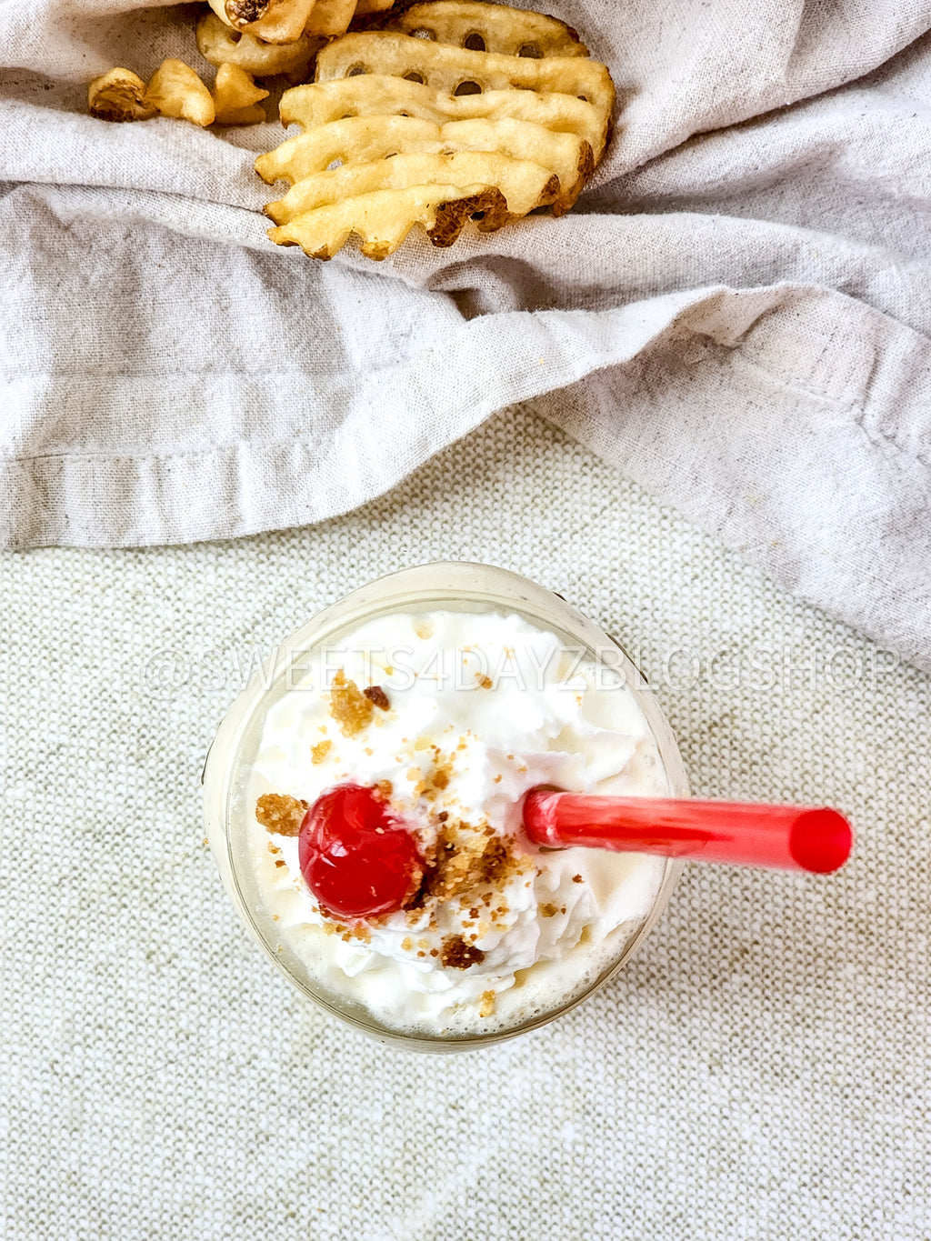 Copycat Chick Fil A Caramel Crunch Milkshake on Linen