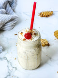 Copycat Chick Fil A Caramel Crunch Milkshake on Marble