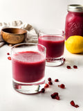 Homemade Pomegranate Juice on White