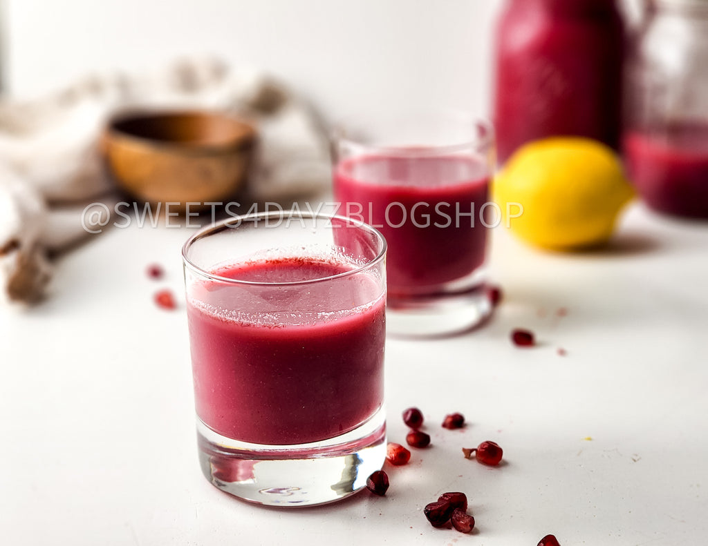 Homemade Pomegranate Juice on White