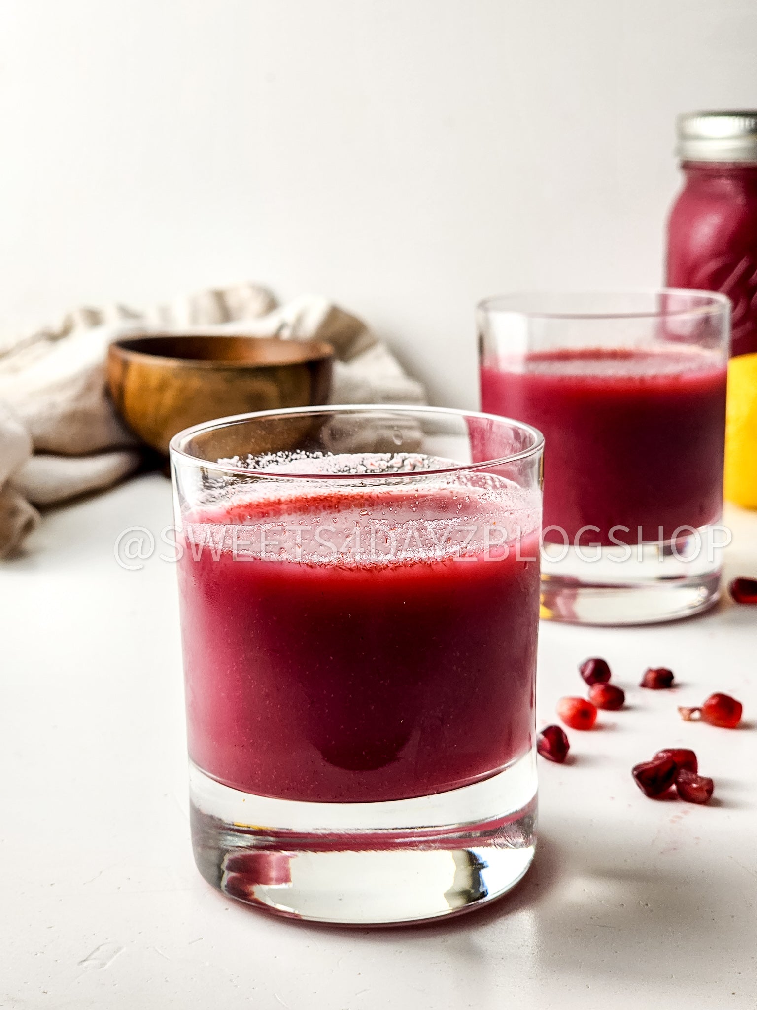Homemade Pomegranate Juice on White