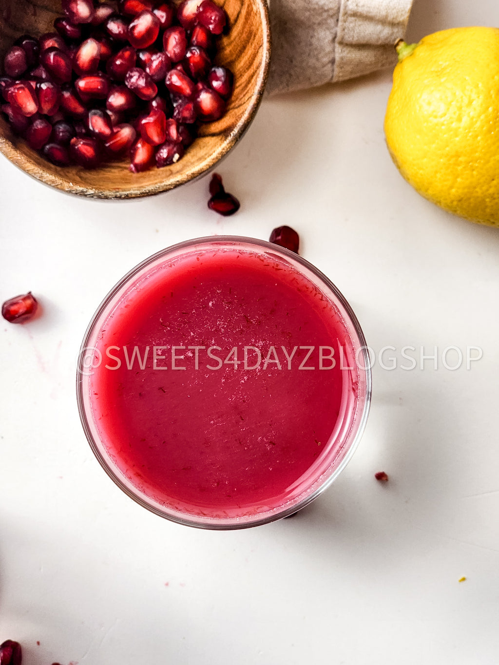 Homemade Pomegranate Juice on White