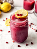 Homemade Pomegranate Juice on Marble