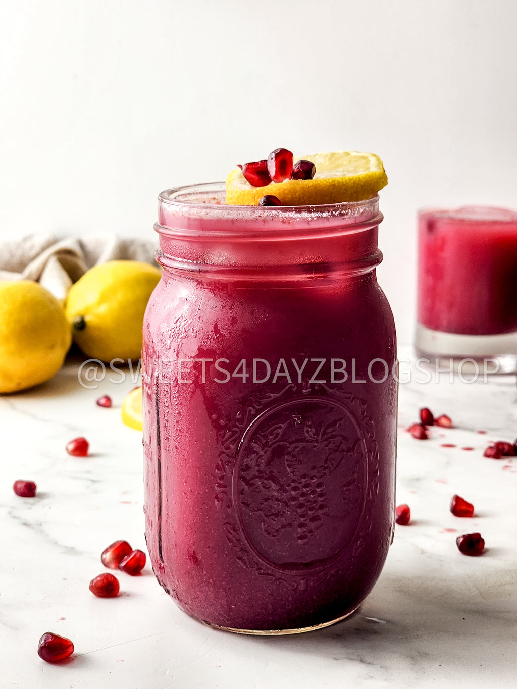Homemade Pomegranate Juice on Marble