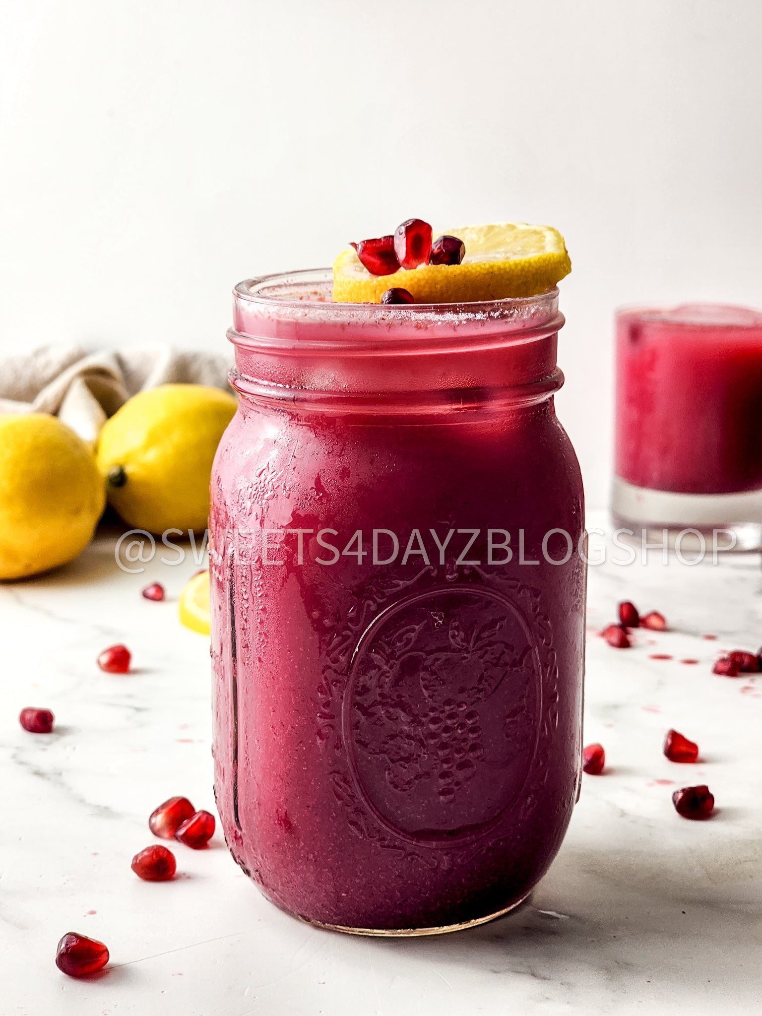 Homemade Pomegranate Juice on Marble