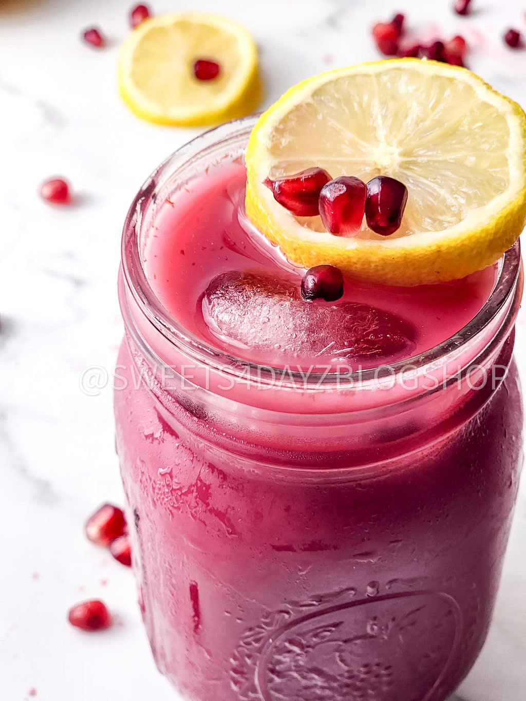 Homemade Pomegranate Juice on Marble