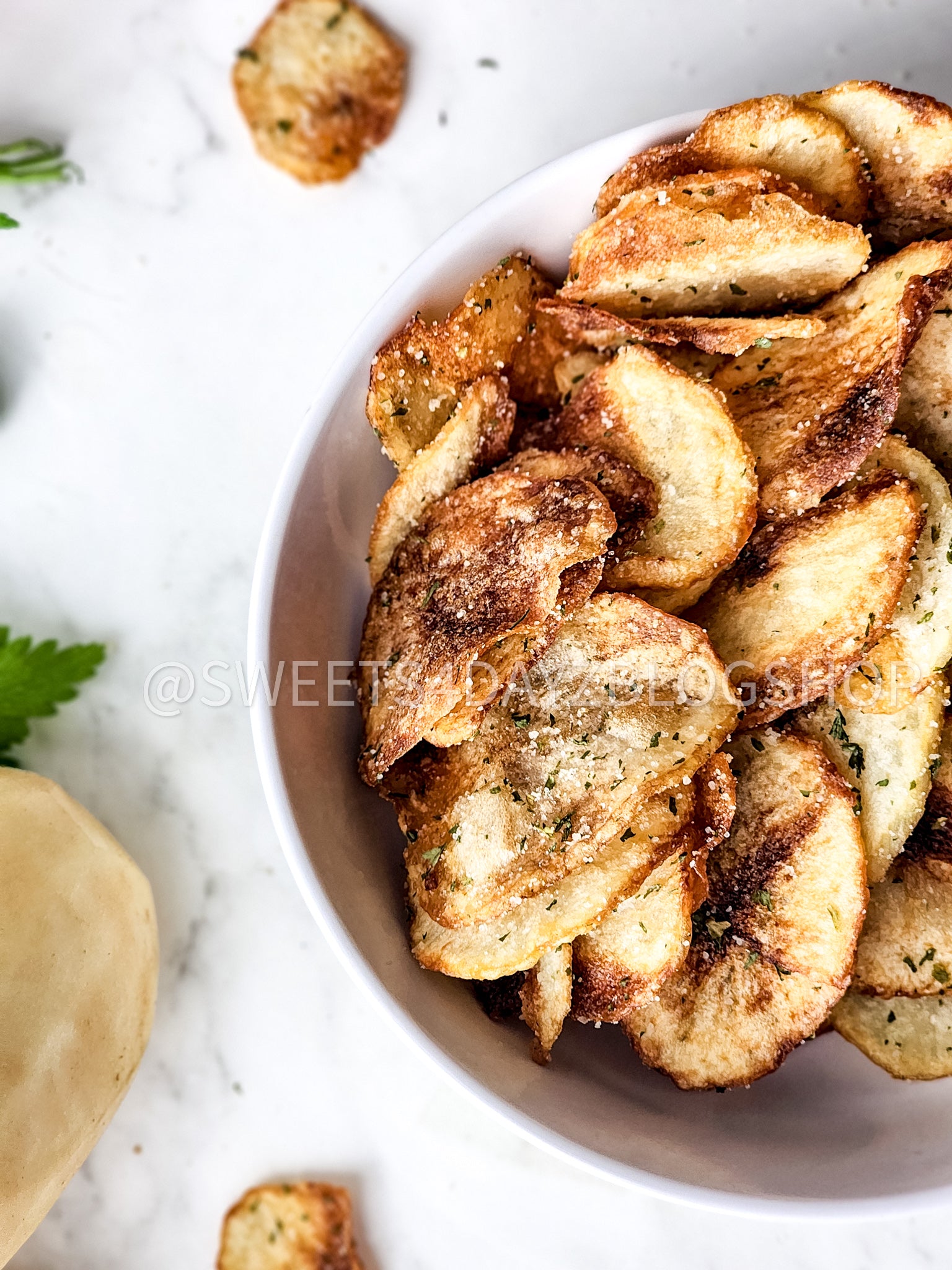 Homemade Potato Chips on Marble