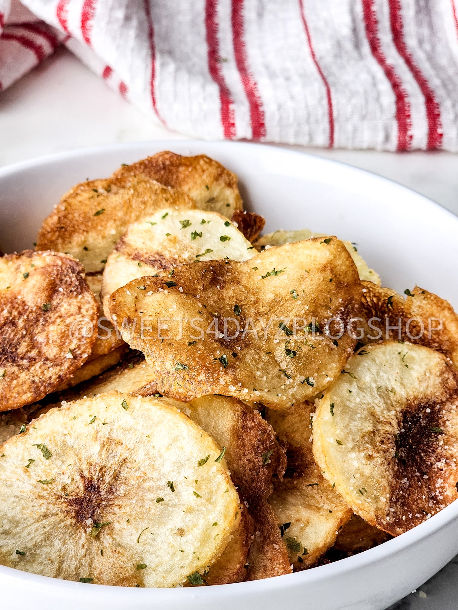 Homemade Potato Chips on Marble
