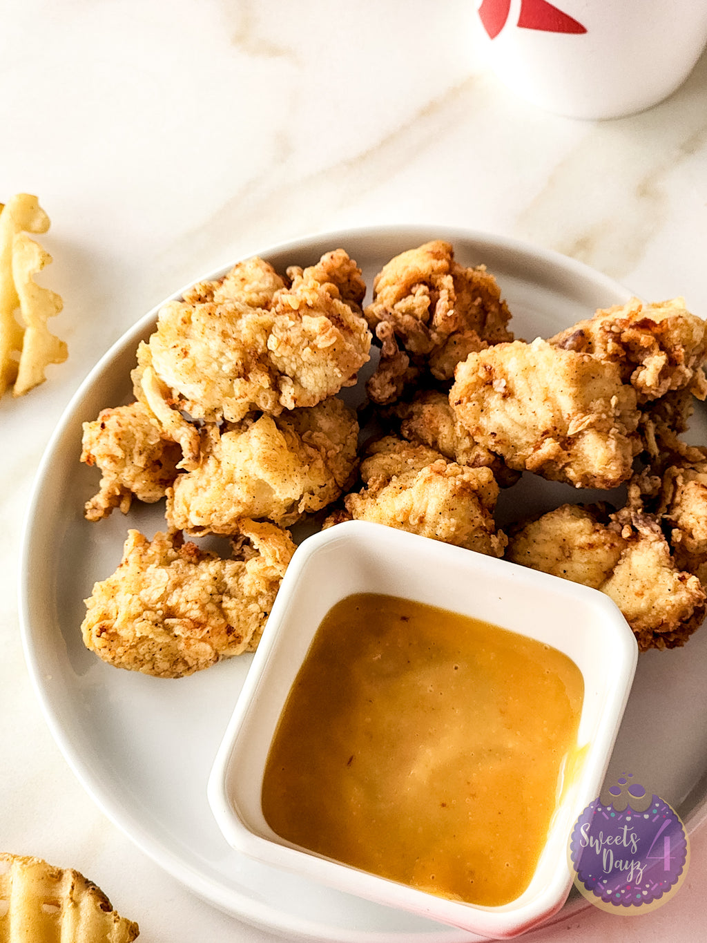 Copycat Chick Fil A Nuggets on Gold Marble