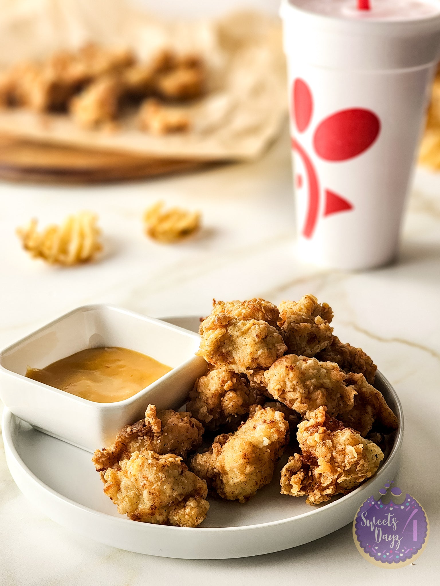 Copycat Chick Fil A Nuggets on Gold Marble
