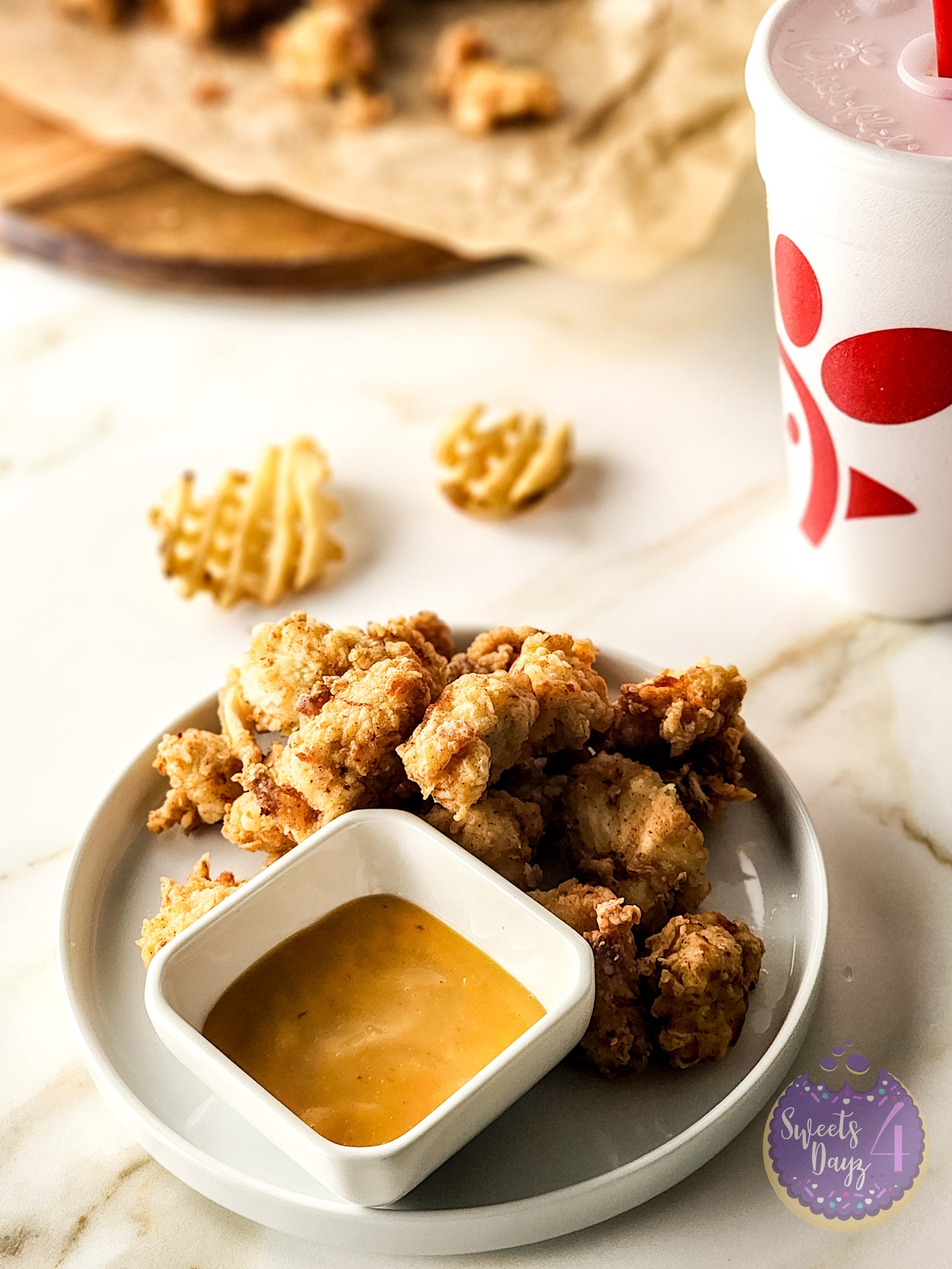 Copycat Chick Fil A Nuggets on Gold Marble