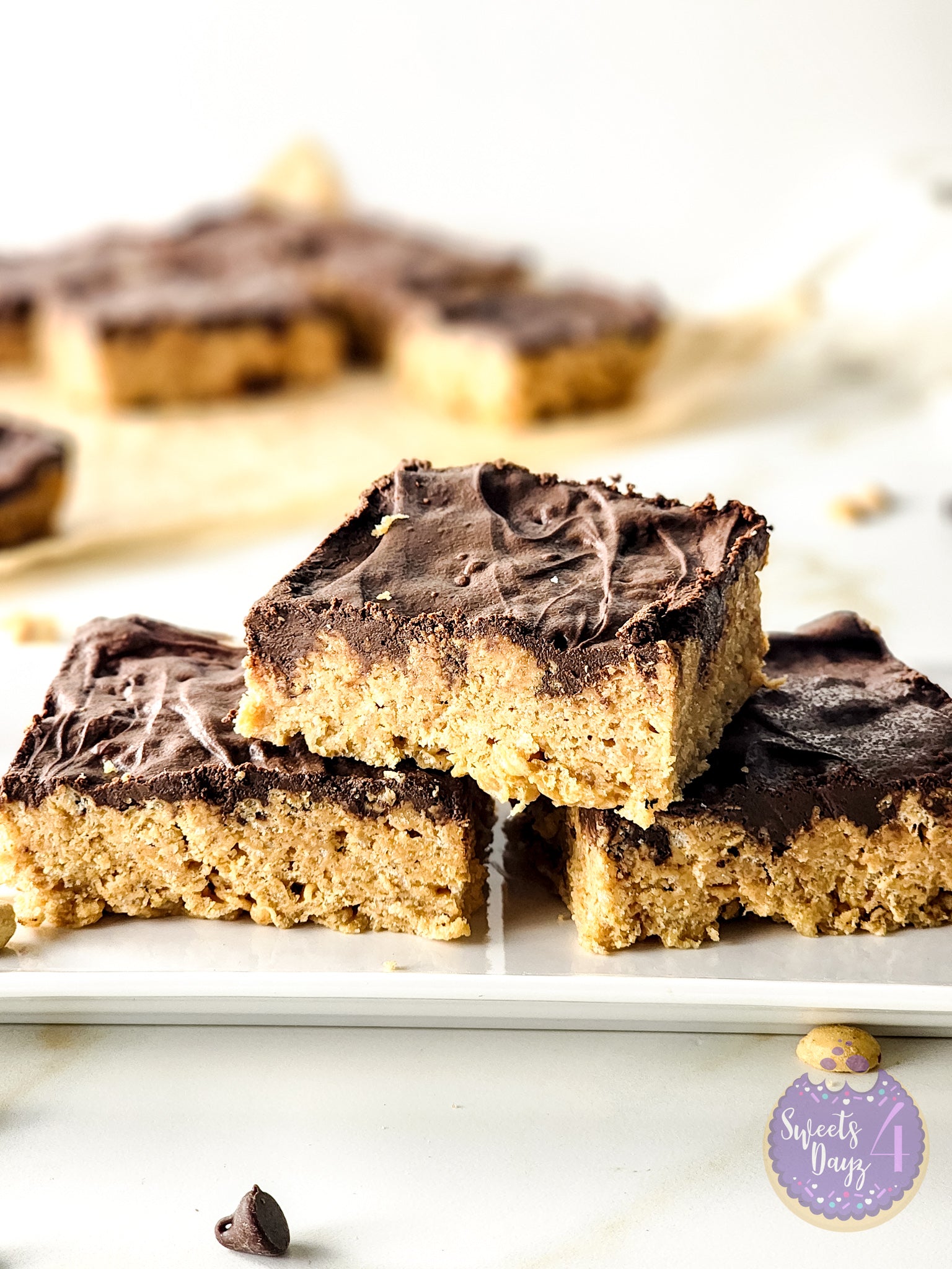 Peanut Butter Chocolate Rice Krispy Treats on Gold Marble