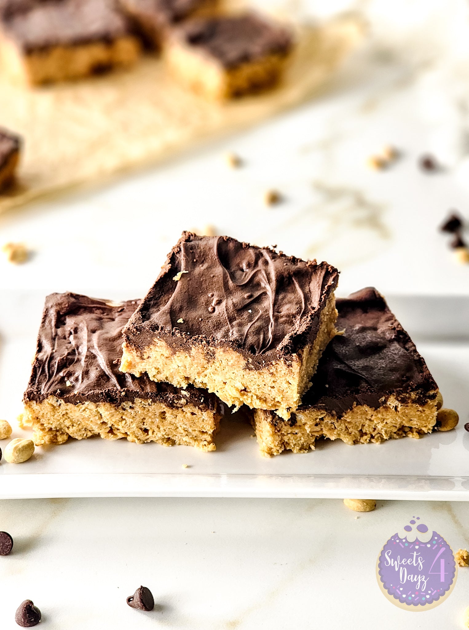 Peanut Butter Chocolate Rice Krispy Treats on Gold Marble