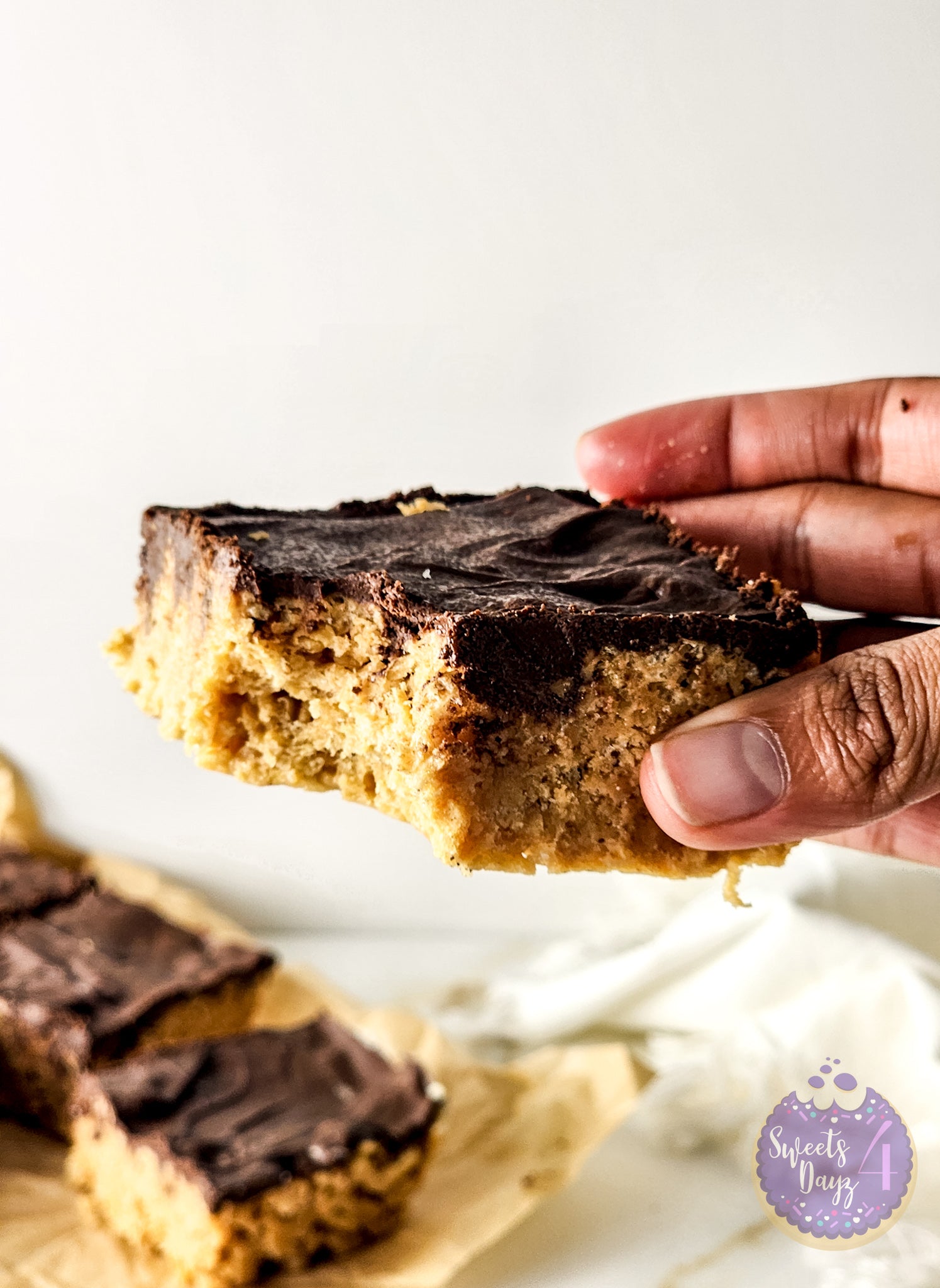 Peanut Butter Chocolate Rice Krispy Treats on Gold Marble