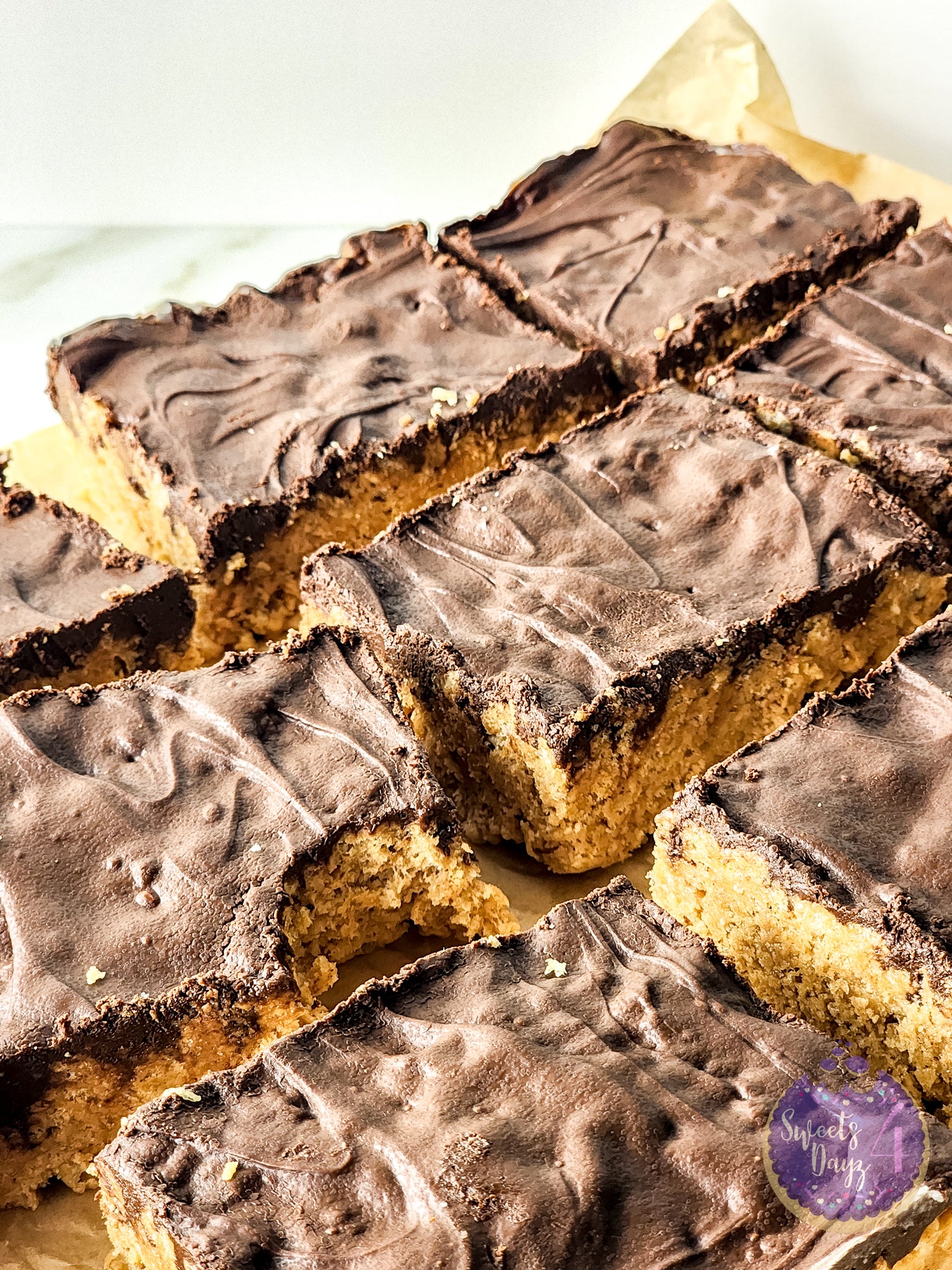 Peanut Butter Chocolate Rice Krispy Treats on Gold Marble