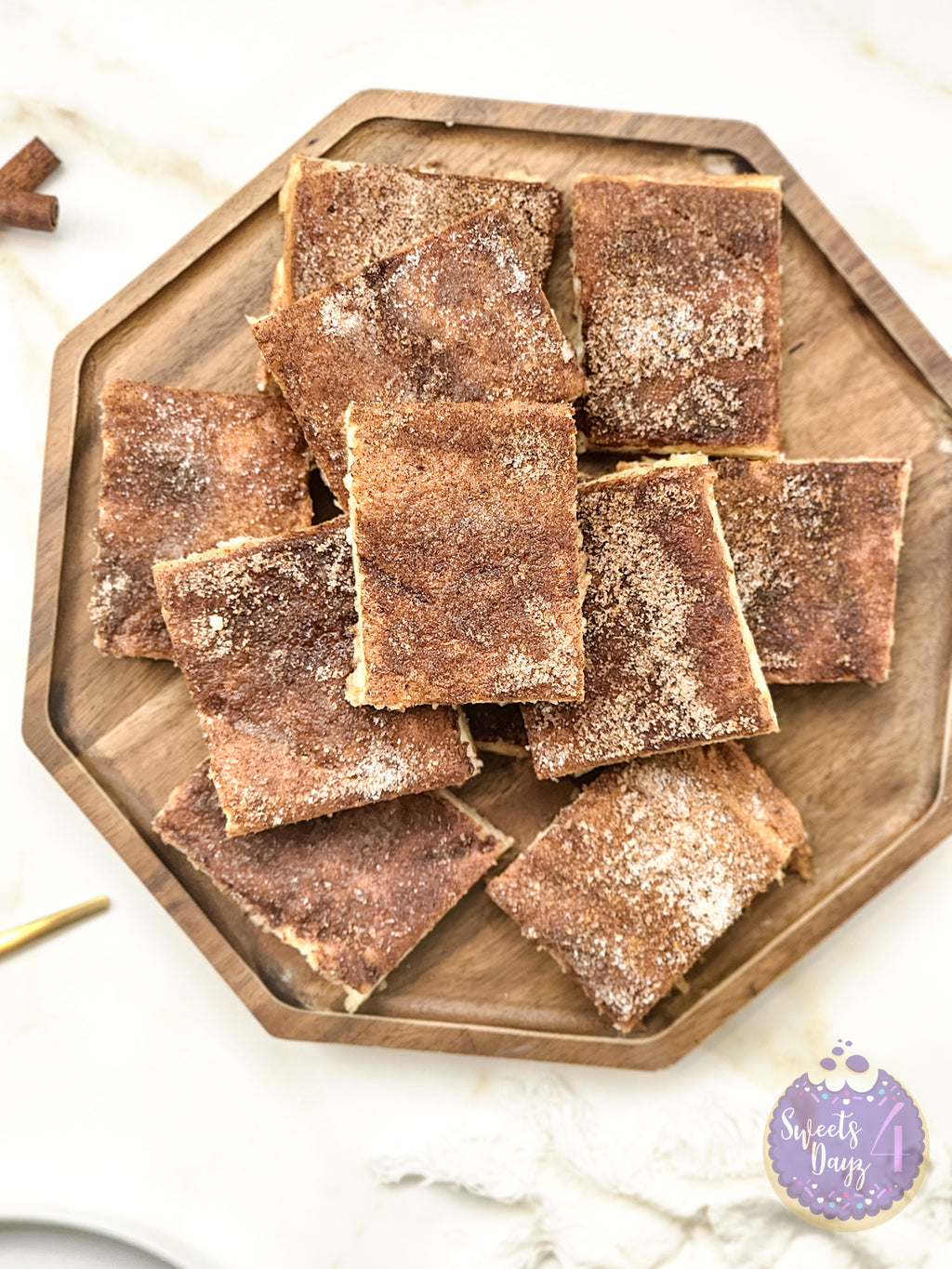 Churro Cheesecake Bars on Gold Marble
