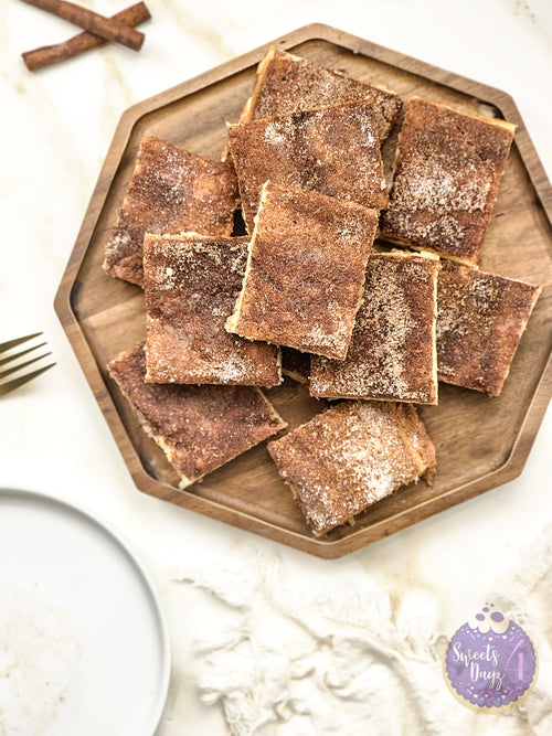 Churro Cheesecake Bars on Gold Marble