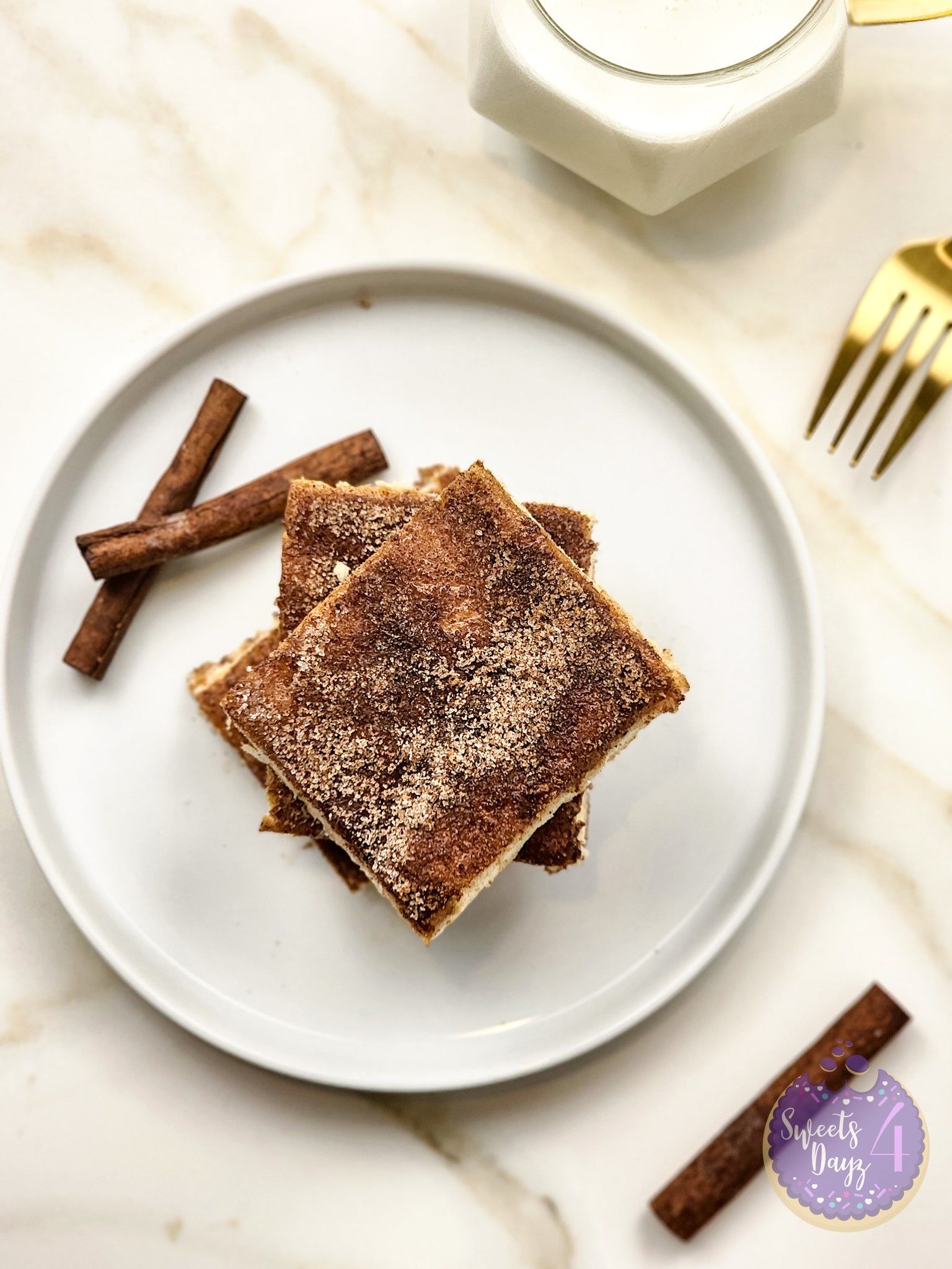 Churro Cheesecake Bars on Gold Marble