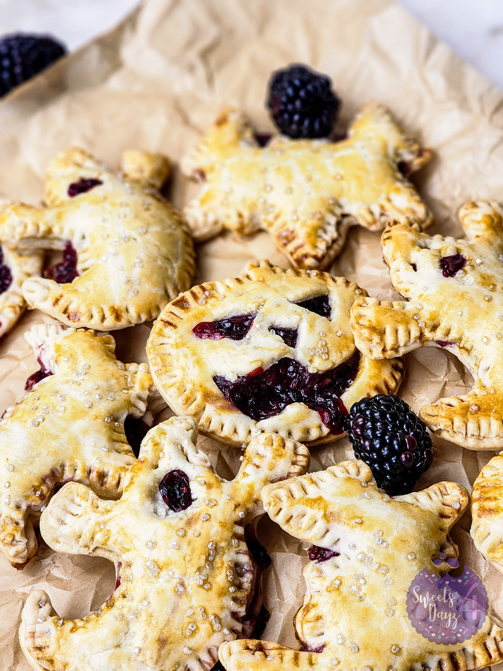 Spooky Fruit Hand Pies on Gold Marble