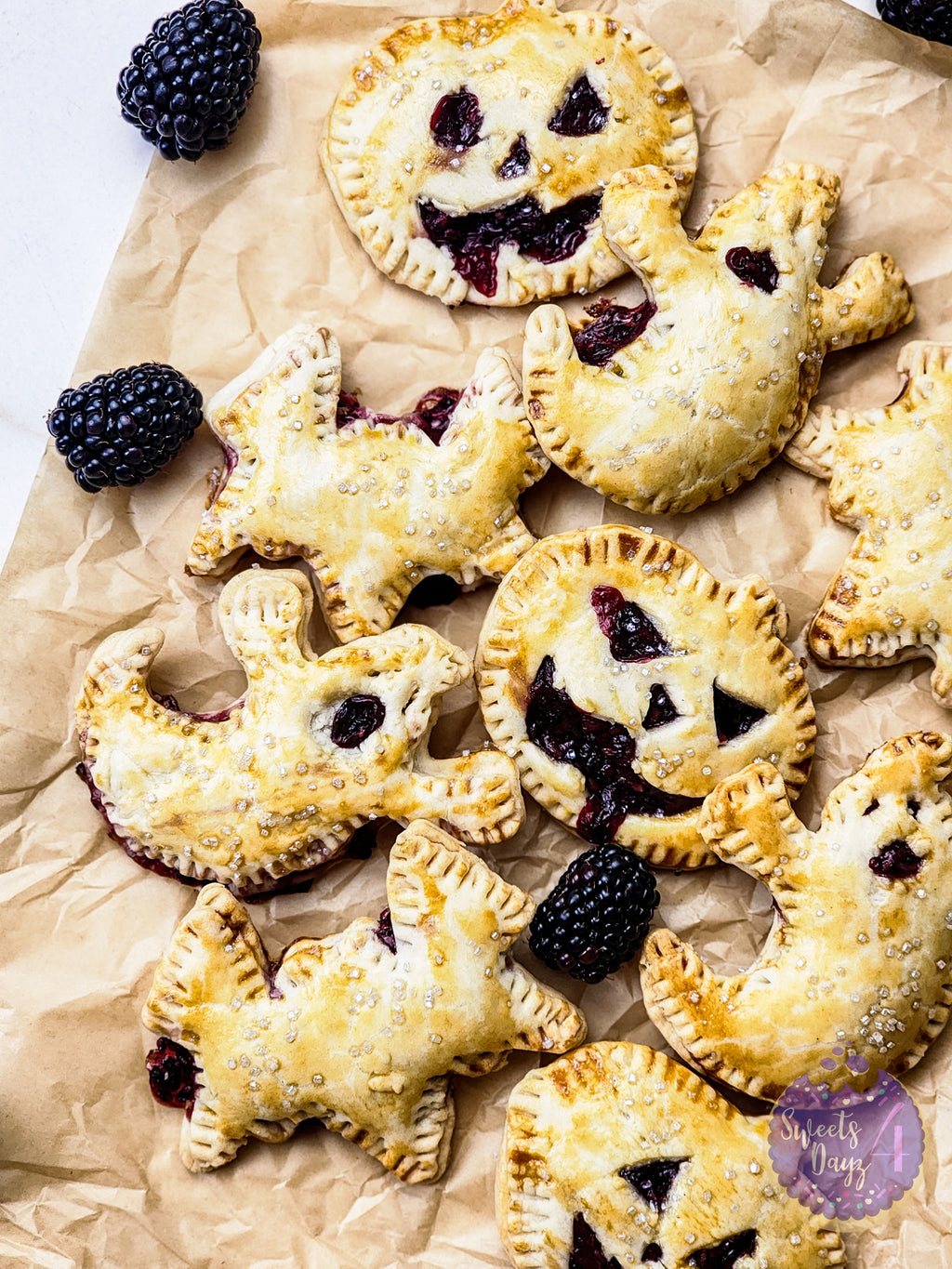 Spooky Fruit Hand Pies on Gold Marble