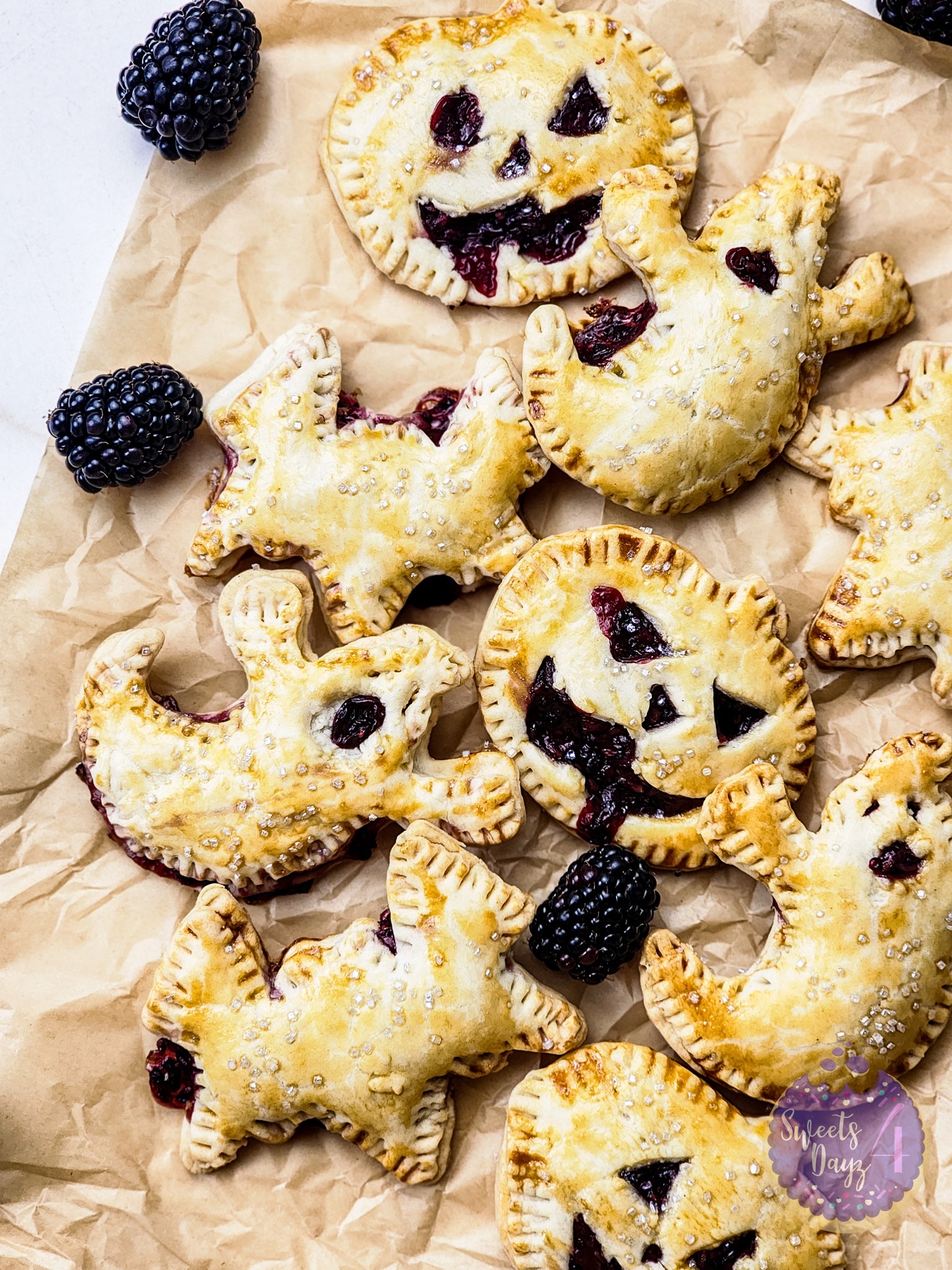 Spooky Fruit Hand Pies on Gold Marble