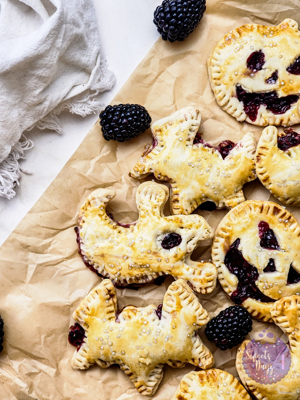Spooky Fruit Hand Pies on Gold Marble