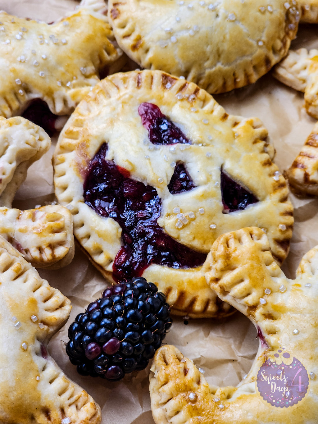 Spooky Fruit Hand Pies on Gold Marble