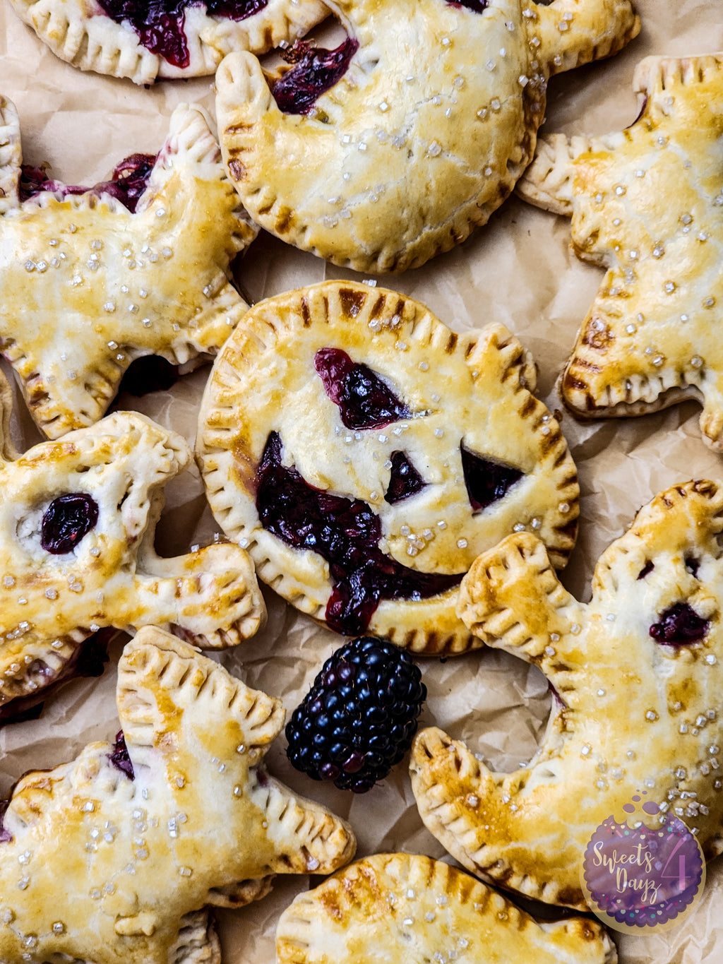 Spooky Fruit Hand Pies on Gold Marble