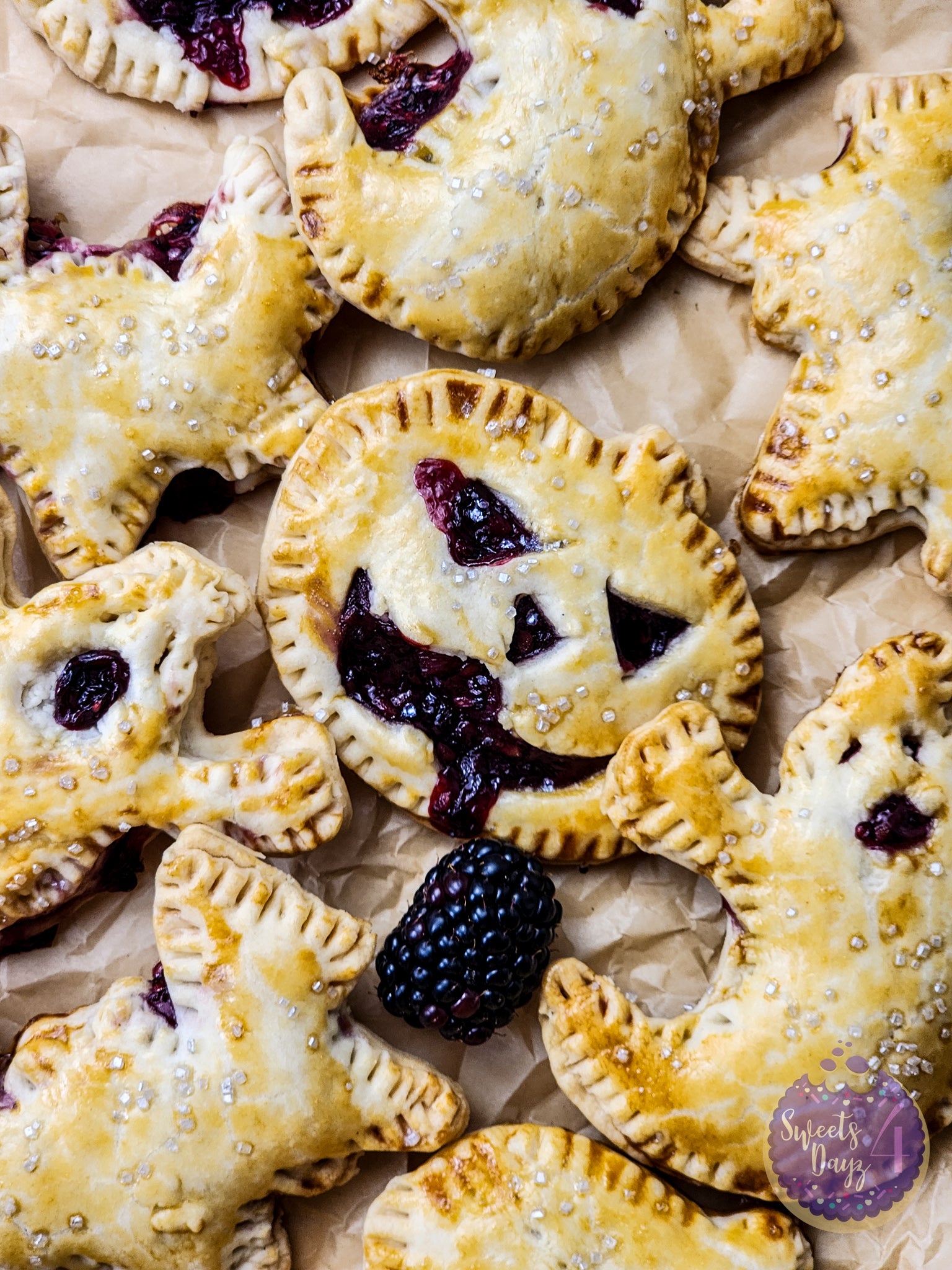 Spooky Fruit Hand Pies on Gold Marble