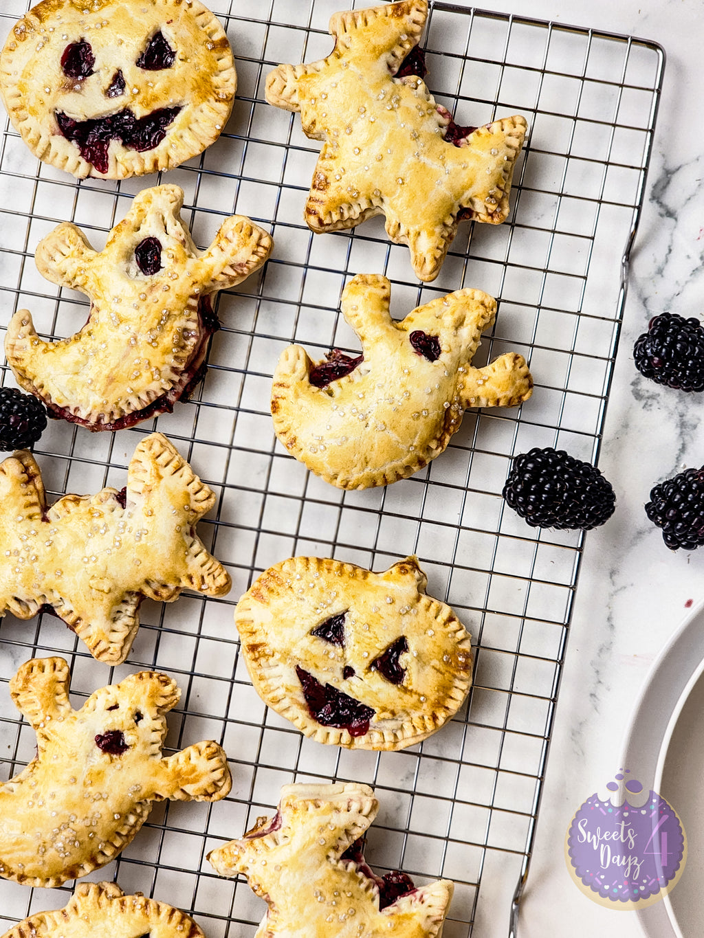 Spooky Fruit Hand Pies on Marble