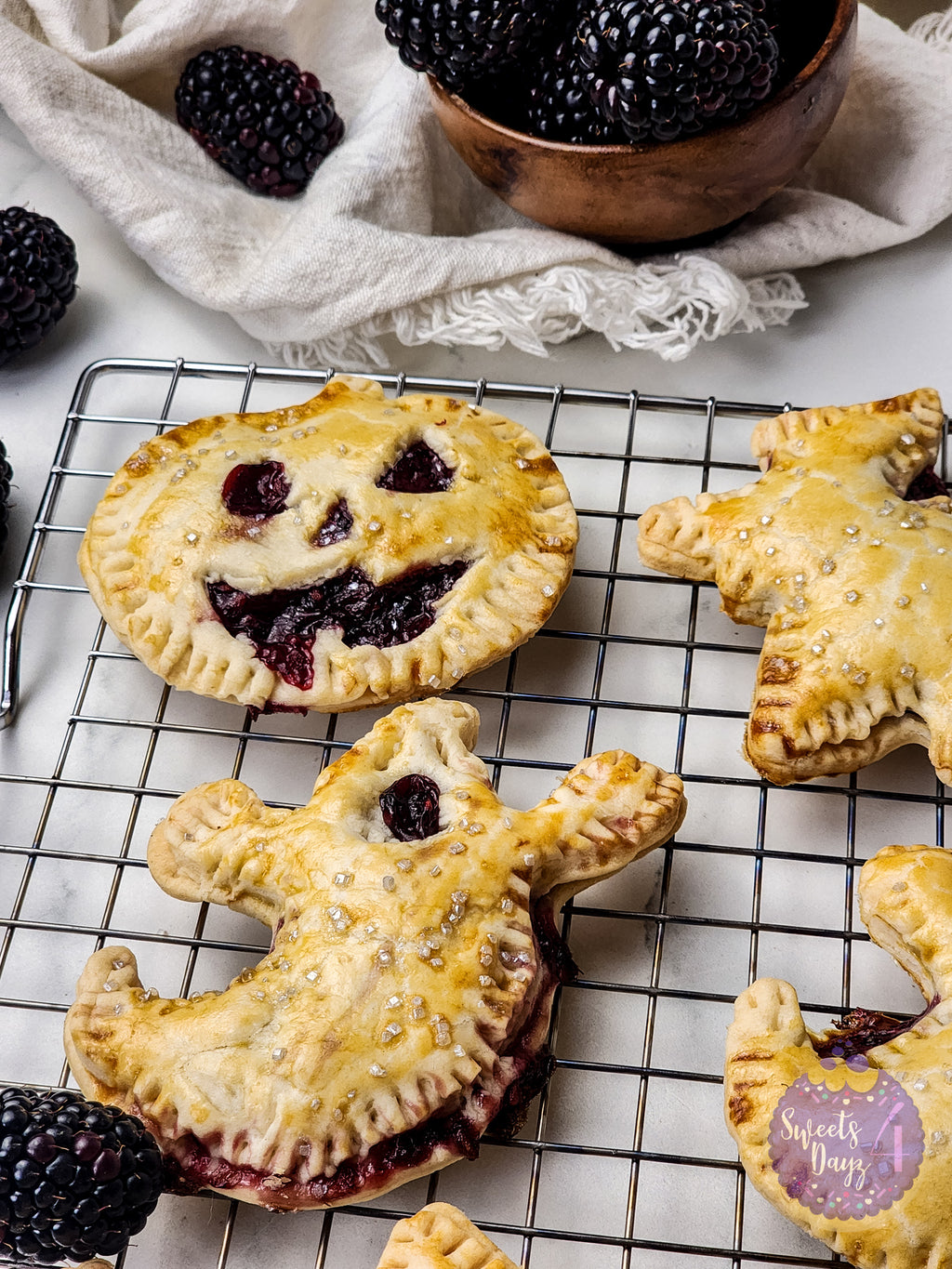 Spooky Fruit Hand Pies on Marble