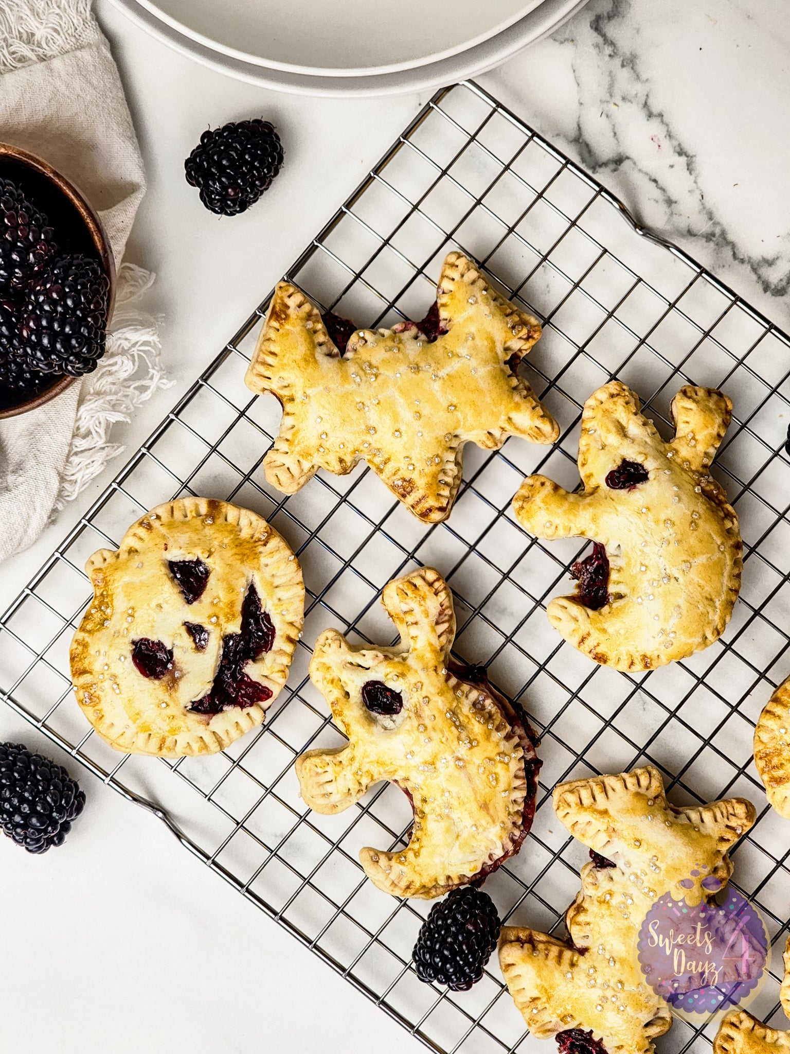 Spooky Fruit Hand Pies on Marble