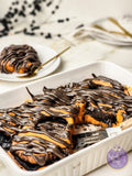 Halloween Cinnamon Rolls on Gold Marble