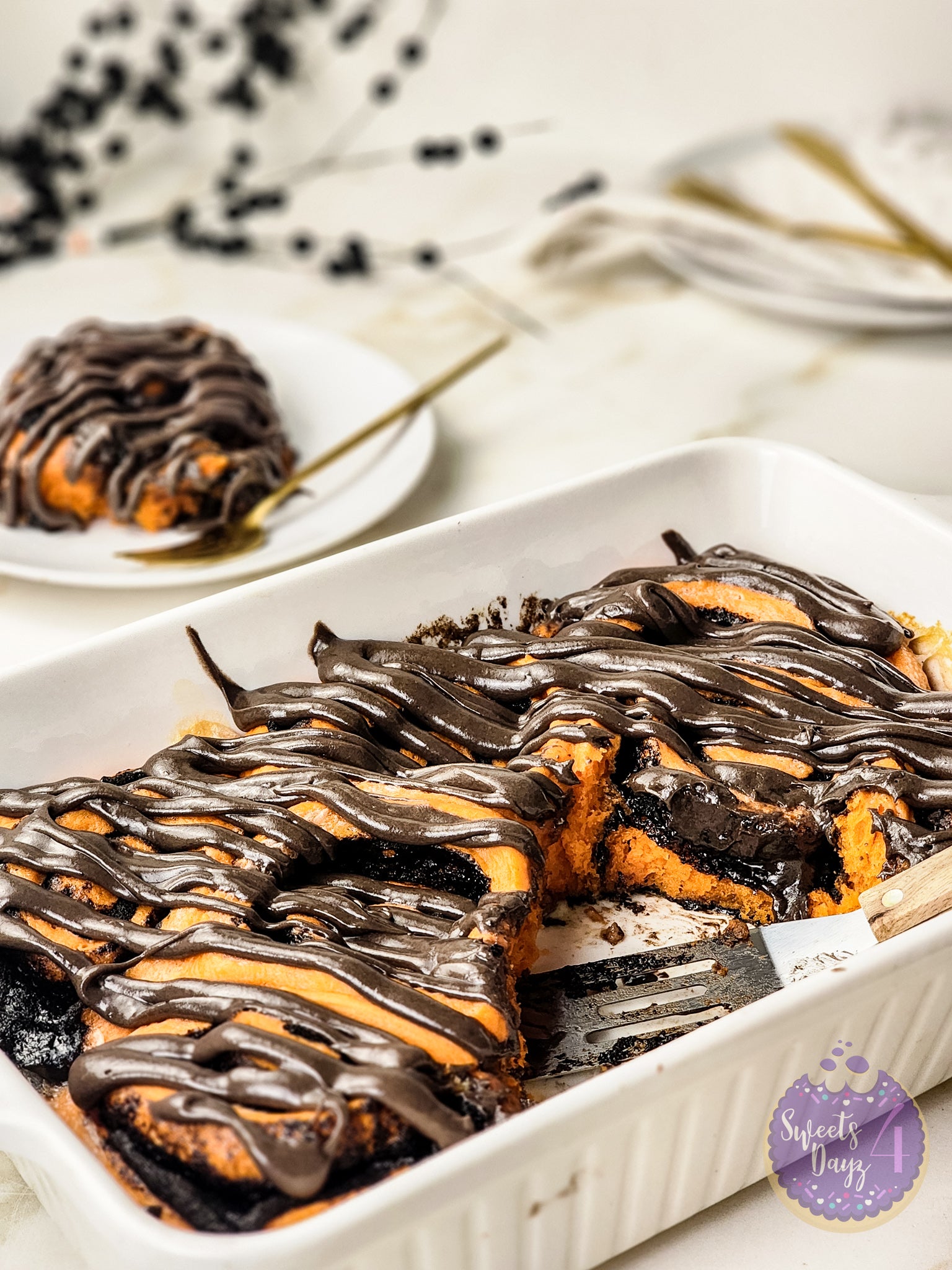 Halloween Cinnamon Rolls on Gold Marble