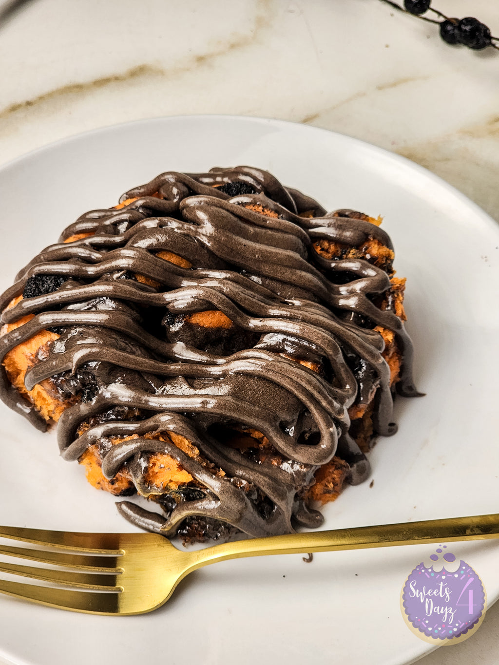 Halloween Cinnamon Rolls on Gold Marble