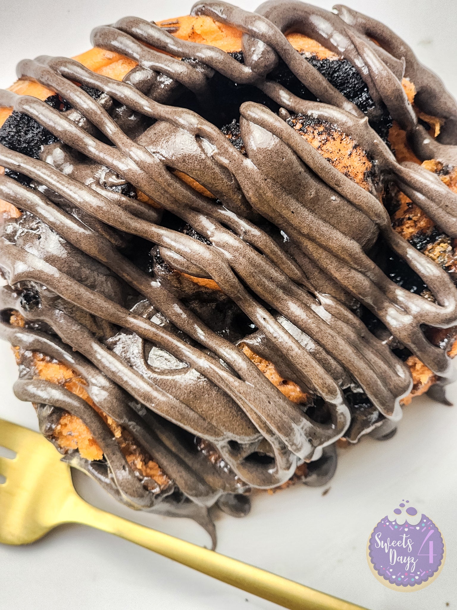 Halloween Cinnamon Rolls on Gold Marble