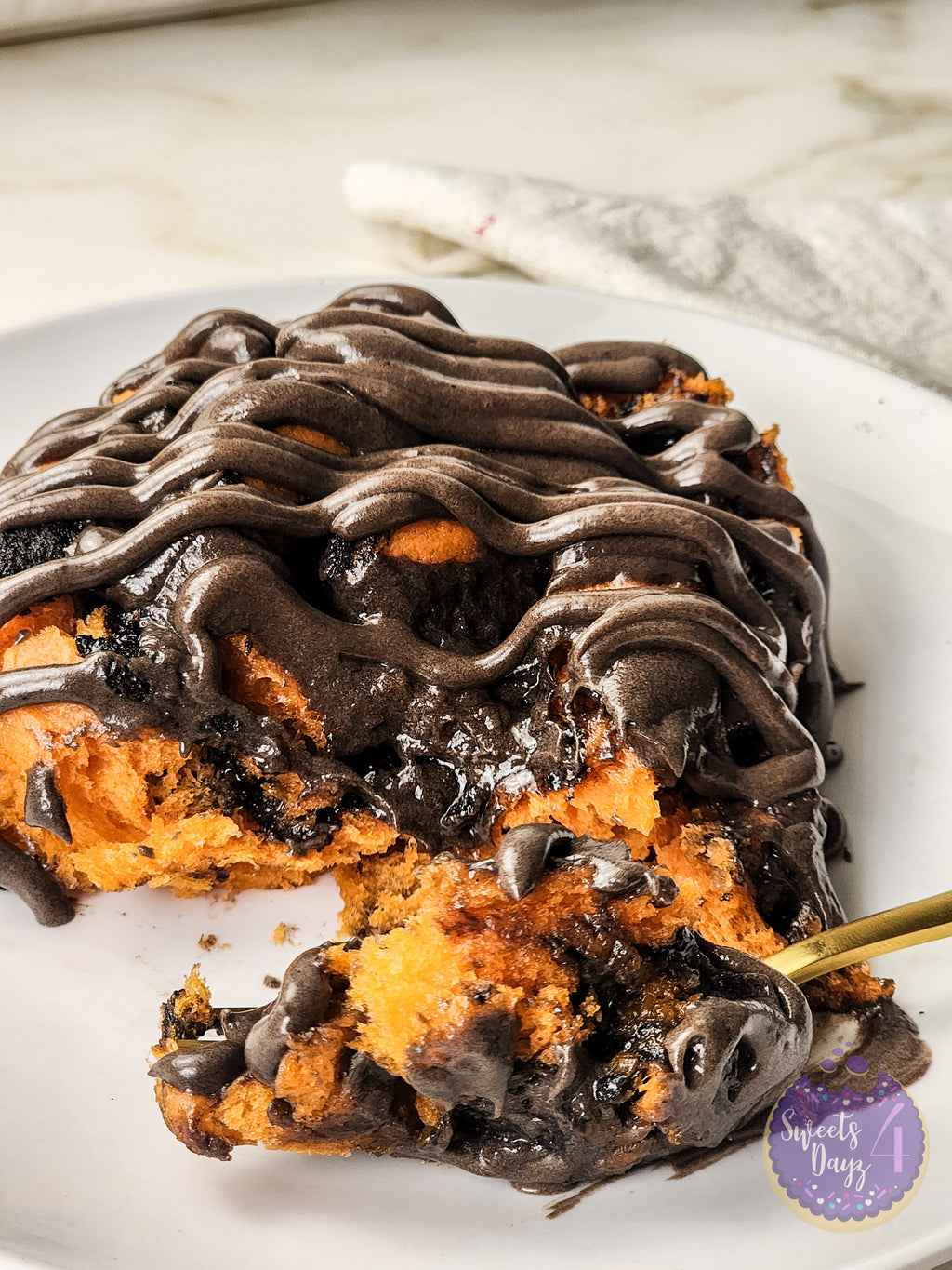 Halloween Cinnamon Rolls on Gold Marble