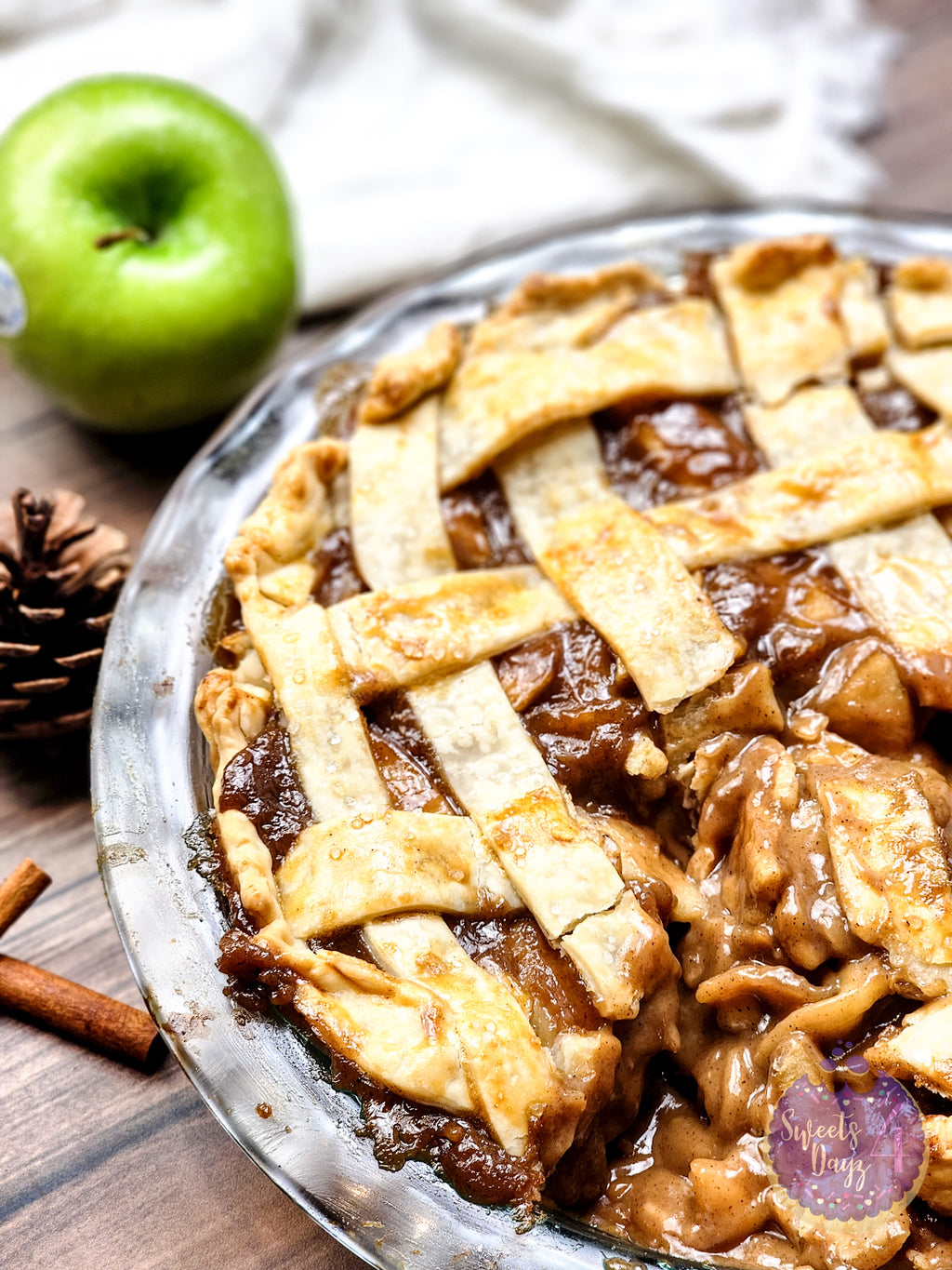 Salted Caramel Apple Pie on Brown Wood