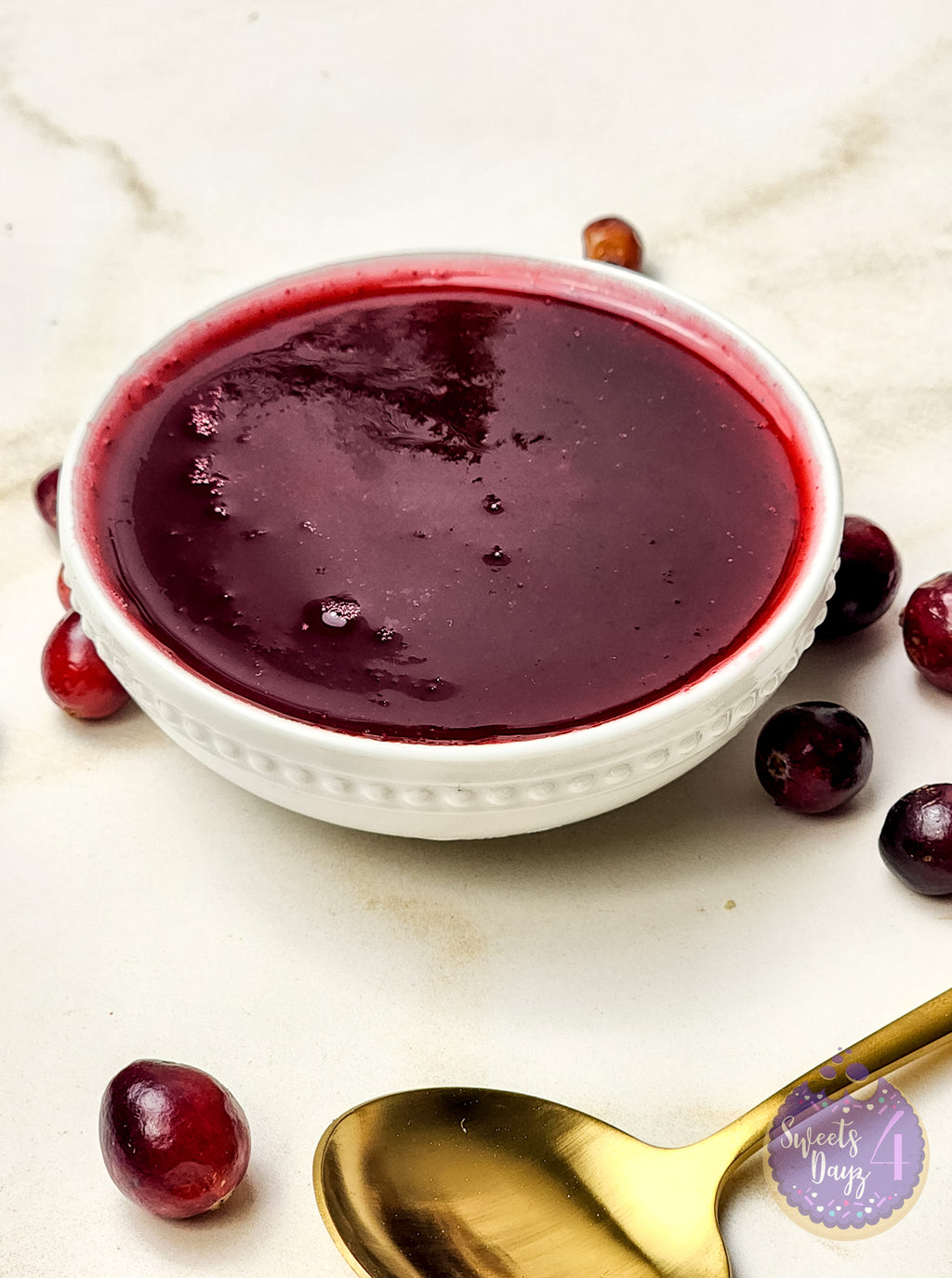 Homemade Cranberry Sauce on Gold Marble