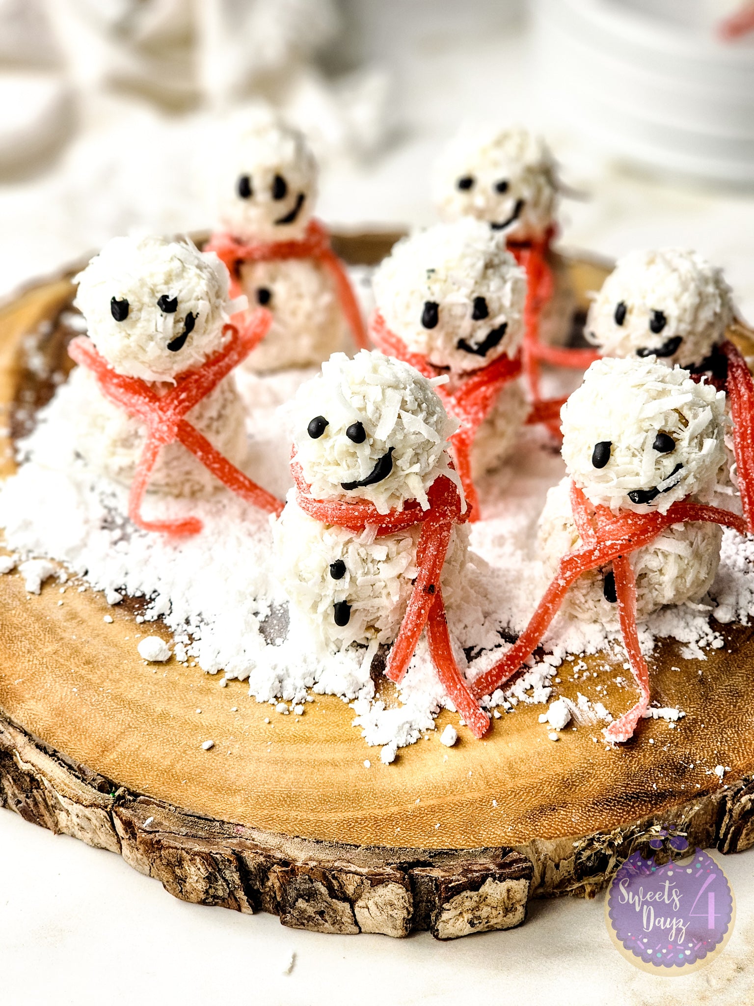 Snowman Truffles on Gold Marble