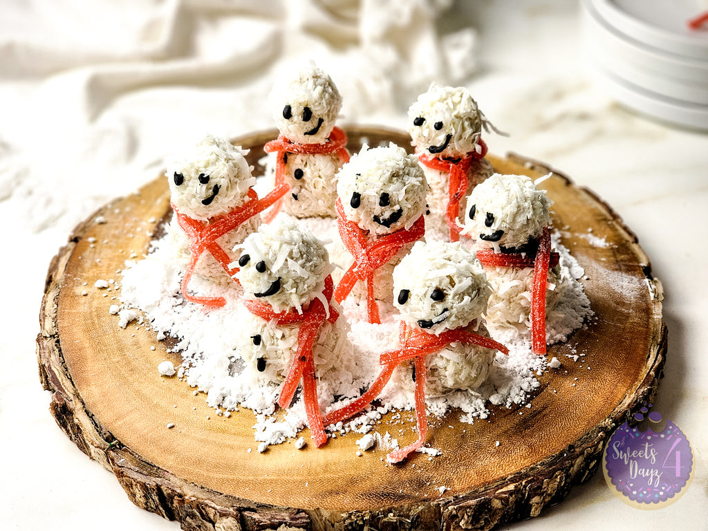 Snowman Truffles on Gold Marble