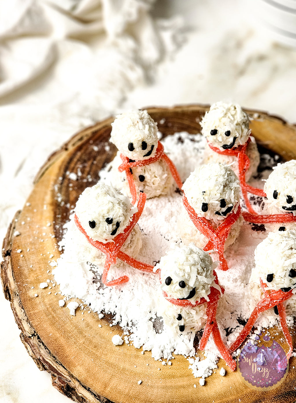 Snowman Truffles on Gold Marble