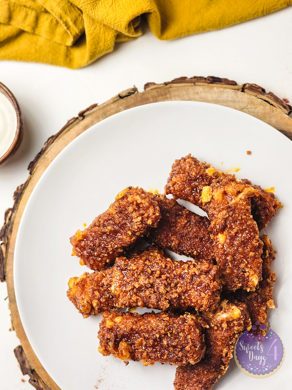 Copycat Chilis Nashville Hot Mozzarella Sticks on White
